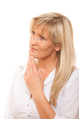 Portrait thoughtful pensive mature woman isolated