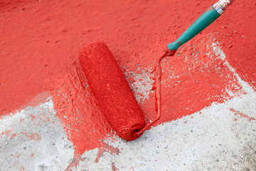 red paint roller