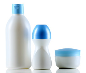 Group of cosmetic bottles isolated on white