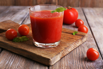 Glass of tomato juice with cherry tomatoes