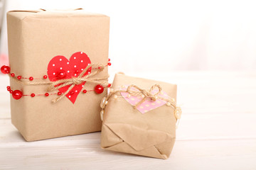 Beautiful gift box on wooden table. Valentine Day concept