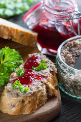 traditional liver pate on fresh bread with cranberry