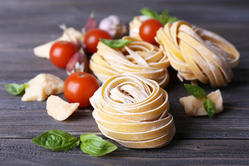 Raw homemade pasta with cheese and vegetables