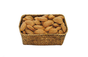 Almonds in shell close up isolated on white