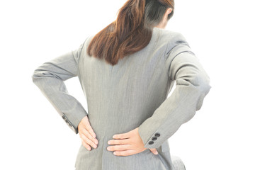 腰痛を訴える女性