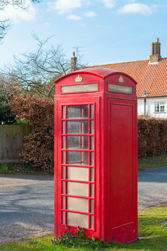 British Telecom telephone box in a Suffolk Village, UK