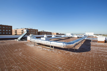 View on the roof of a building of a large air conditioning equip