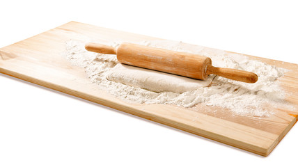 dough with rolling pin on board isolated on white background