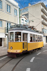 Fototapeta na wymiar Yellow tram in Lisbon, Portugal