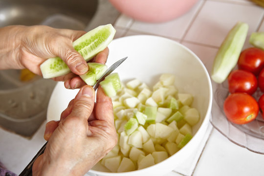 Preparing vegetables for salad