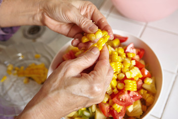 Preparing vegetables for salad