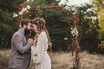beard man and nice woman in the wood