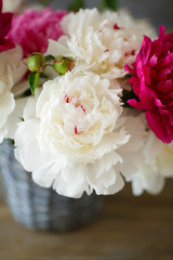 Peonies in old vase