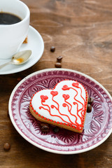 Tasty cookies on a plate with coffee