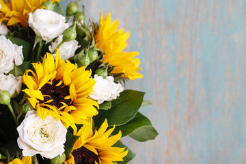 Bouquet of white roses and sunflowers