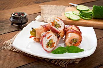 Delicious chicken rolls stuffed with green beans and carrots 