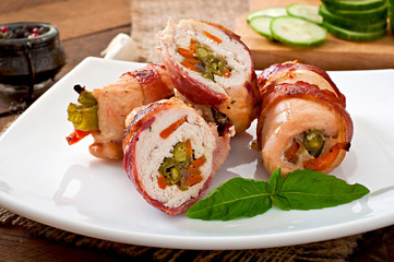 Delicious chicken rolls stuffed with green beans and carrots 