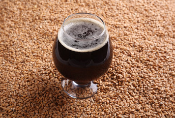 Snifter with stout over malt