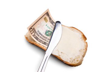butter and money on a slice of bread