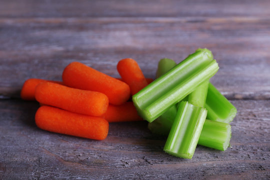 Sticks Of Celery And Carrot On Rustic Wooden Background