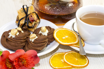 cookies and tea on a table in a restaurant