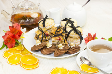 cookies and tea on a table in a restaurant