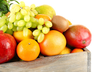Assortment of fruits in box isolated on white