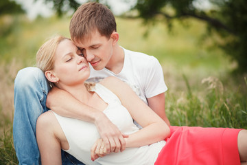 close-up, couple lying on the grass