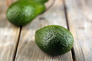 Avocado on wooden background