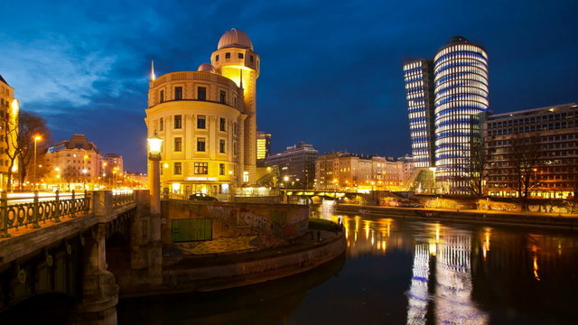 Timelapse - Urania and UNIQA Tower at the Danube Canal Vienna