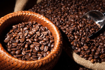 roasted coffee beans in a bamboo basket