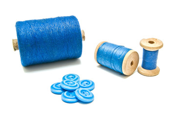 spools of thread and plastic buttons