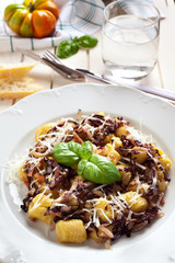 gnocchi with smoked ham and blue cabbage