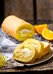 swiss roll with whipped cream and orange cream