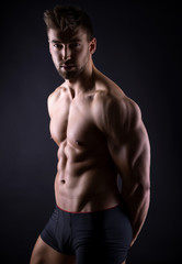 Fototapeta na wymiar handsome young bodybuilder