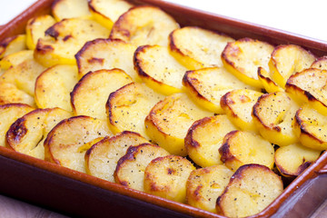 potatoes baked with pork minced meat and red cabbage