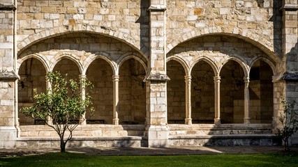 Fototapeta na wymiar Santander Cathedral, front view of eight arches of the cloister
