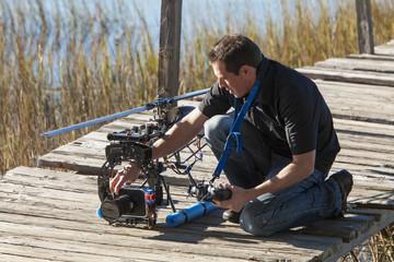 Obraz premium man with helicopter drone