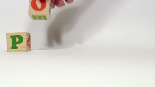 The video shows Polish word built of wooden blocks