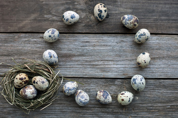 Quail eggs on a wooden table