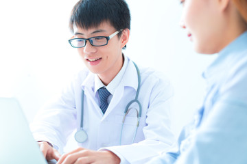 bright picture of male doctor with patient