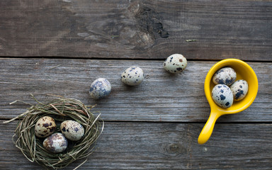 Quail eggs on a wooden table