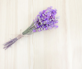 Purple lavender on wood.