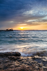 Wonderful solar Red Sea beach at a luxury hotel, at sunset
