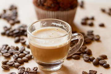 Cup of latte coffee with biscotti