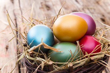 Easter eggs on wooden background