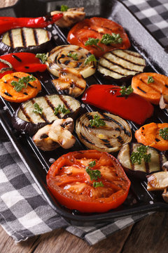 Vegetables cooked on the grill pan closeup. vertical