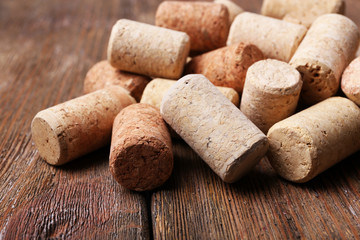 Wine corks on wooden background