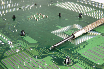 Computer motherboard and Screwdriver.