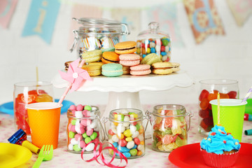 Prepared birthday table with sweets for children party